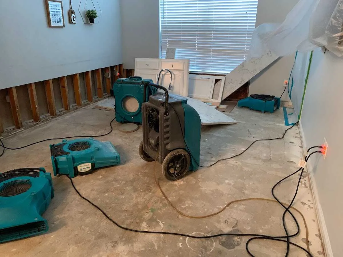 Dehumidifier in flood-cut room for Water Damage Restoration in Phelan